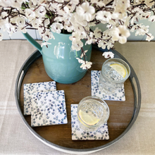 Load image into Gallery viewer, ceramic coasters with small oval leaves in pale green and blue
