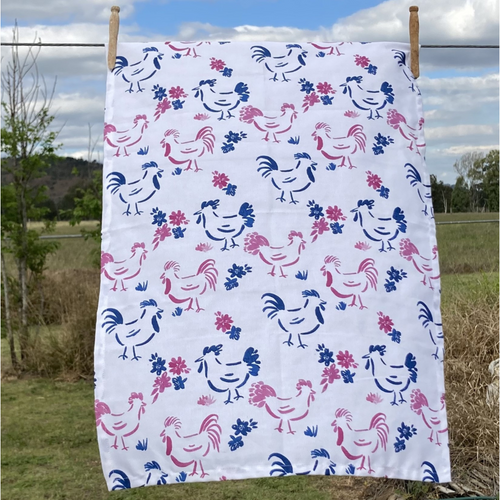 Australian made white cotton tea towel with navy and pink roosters