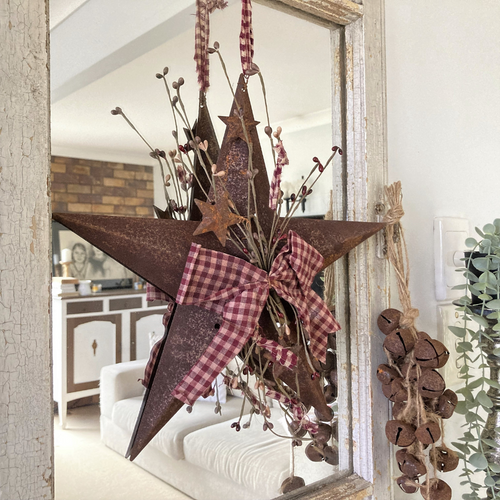 large rustic metal star