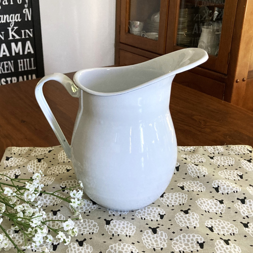 white enamel water pitcher