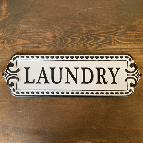 black and white laundry door sign