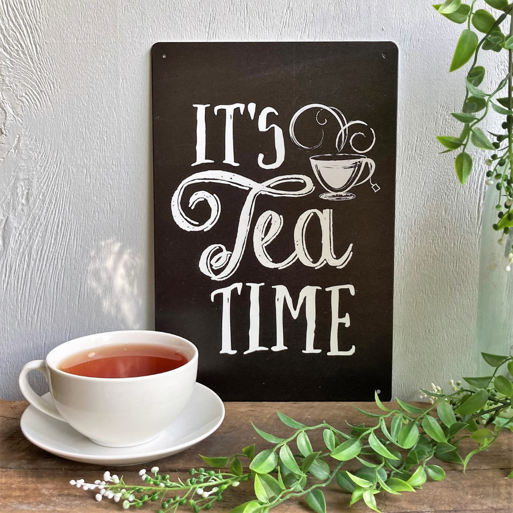 black and white sign about tea