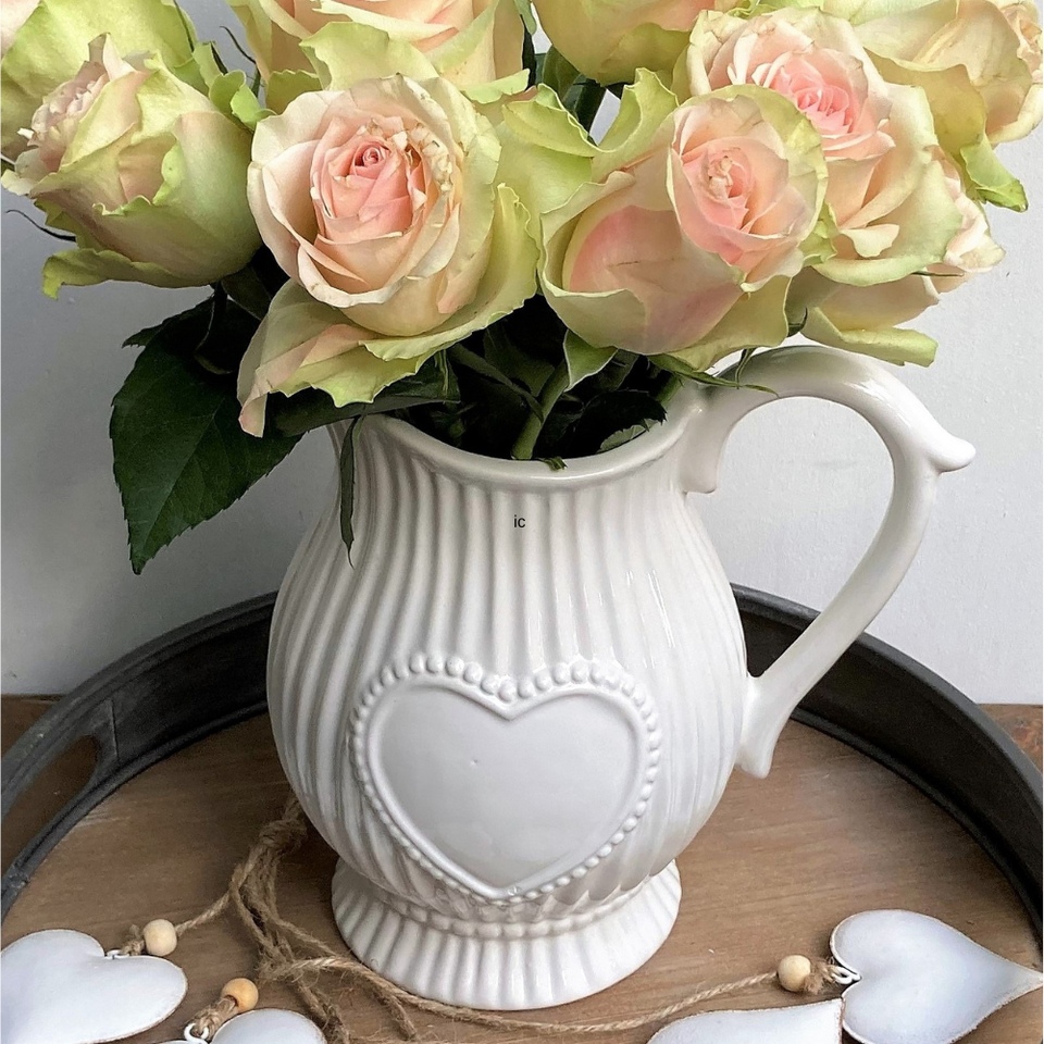 white jug with large dotted heart