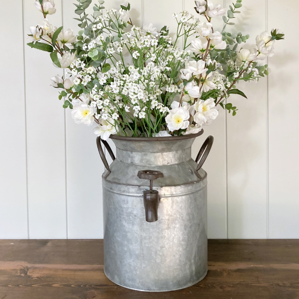 metal churn planter with decorative tap australia