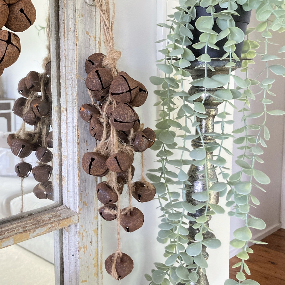 rusted hanging Christmas bells