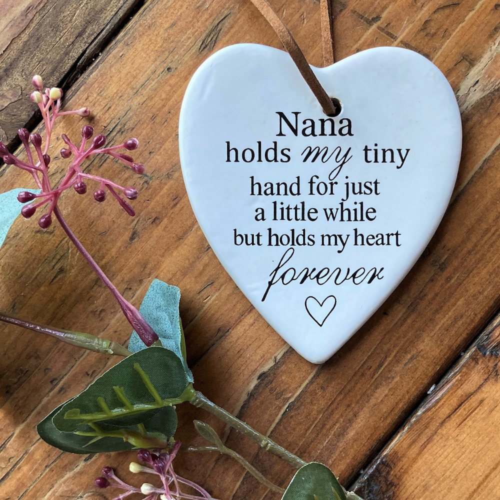 Nana holds my tiny hand